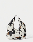Stylish Cow Print Handbag - Spacious Everyday Purse for Women - Durable Polyester Material 1