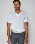 https://cdn.shopify.com/s/files/1/0903/2731/8834/files/Witte_polo_shirt_ga2.webp?v=1743768775