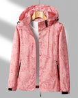 Women's Lightweight Waterproof Outdoor Jacket with Adjustable Hood and Zippered Pockets