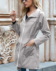 Women's Long Waterproof Coat with Adjustable Hood – Relaxed Fit Rain Jacket for Outdoor Wear 0