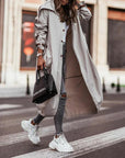 Chic Long Waterproof Coat for Women – Lightweight Rain Coat with Flattering Longline Design 0