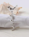 FloraNest | Elegant Decorative Bird & Flower Napkin Ring Set 4
