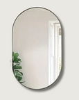 MirrorLuxe - Elegant Oval Reflection 1