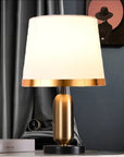 NoirBeam – Sleek Table Lamp in Gold and Black for Subtle Lighting 8