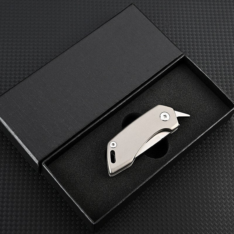 SteelNomad | Compact Titanium Keychain Knife for Travel and Utility 0