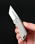SteelNomad | Compact Titanium Keychain Knife for Travel and Utility 1