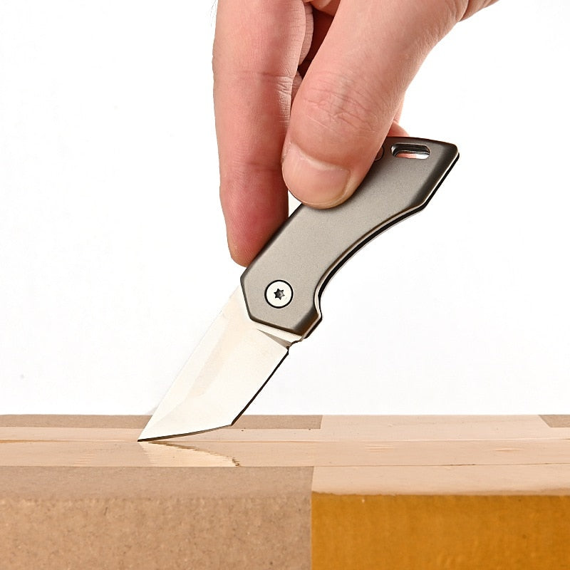 SteelNomad | Compact Titanium Keychain Knife for Travel and Utility 6