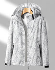 Women's Lightweight Waterproof Outdoor Jacket with Adjustable Hood and Zippered Pockets